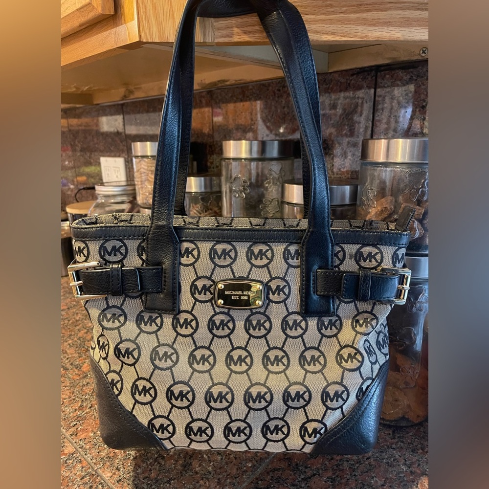 Gently used Michael Kors brown logo and leather satchel